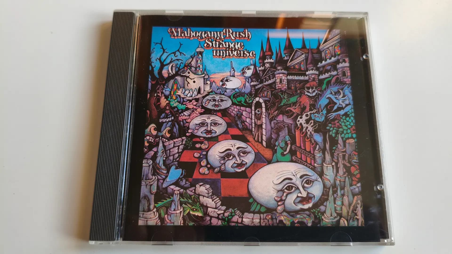 Okładka płyty Mahogany Rush - Strange Universe