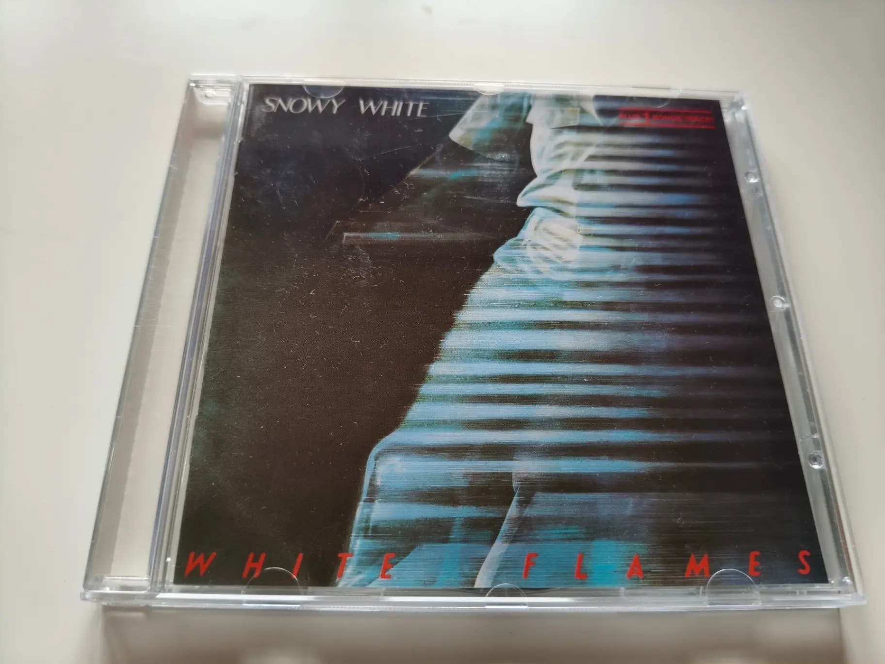 Okładka płyty Snowy White - White Flames